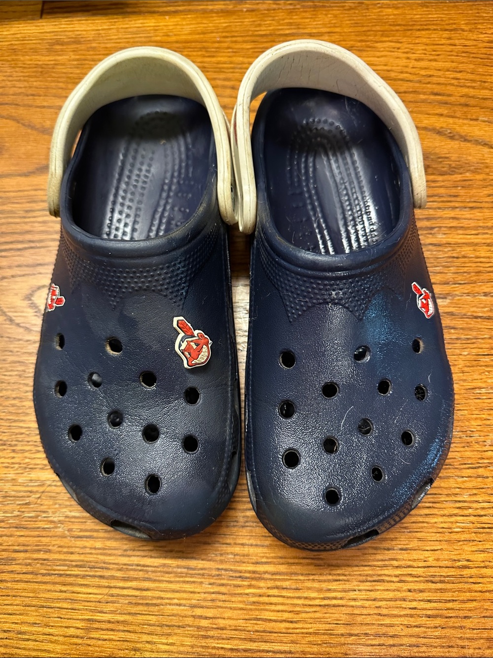 CROCS Navy and White Classic Clogs with Red Charm Accents